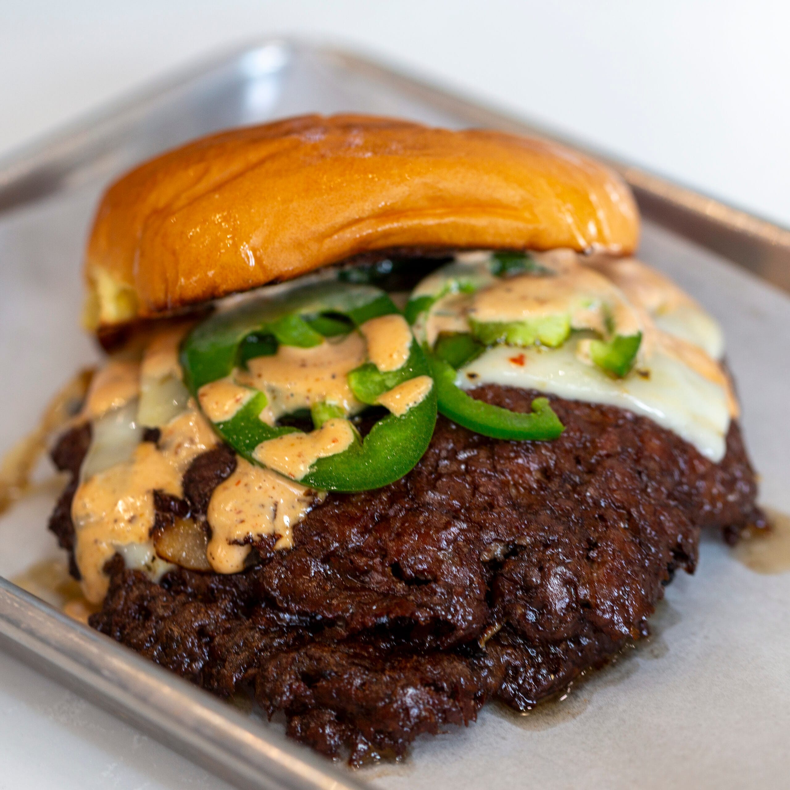 Spicy Smash burger with jalapeños